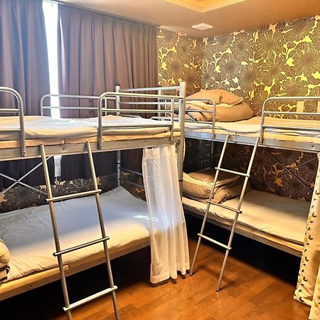 Guesthouse Tiga Кумамото Екстериор снимка