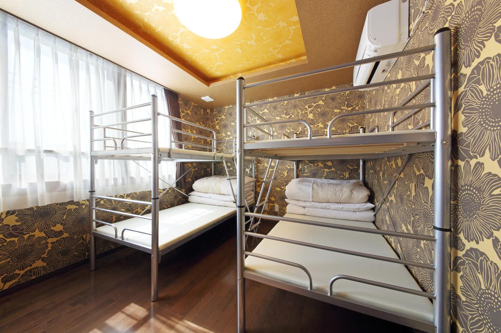 Guesthouse Tiga Кумамото Стая снимка