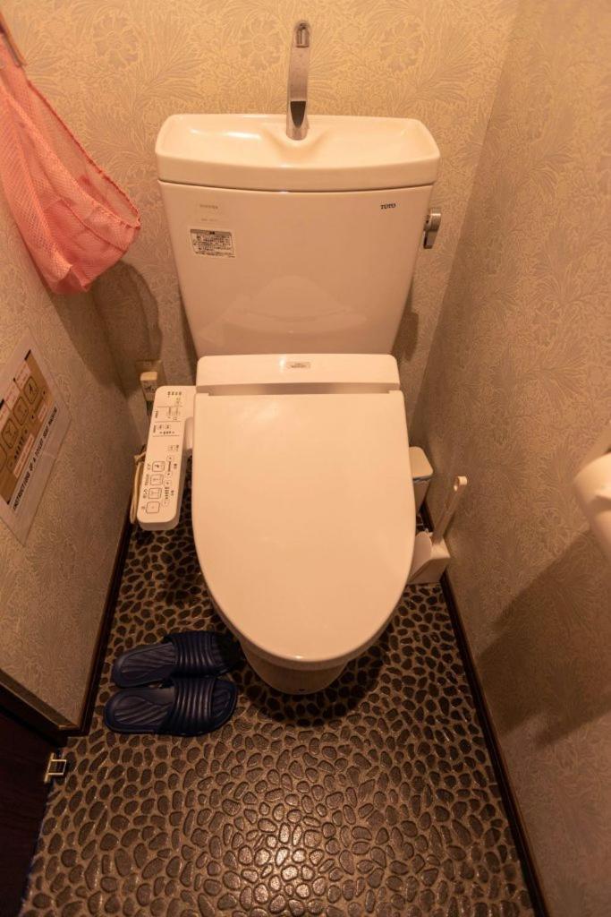 Guesthouse Tiga Кумамото Екстериор снимка