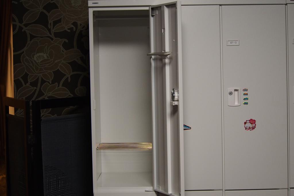 Guesthouse Tiga Кумамото Стая снимка
