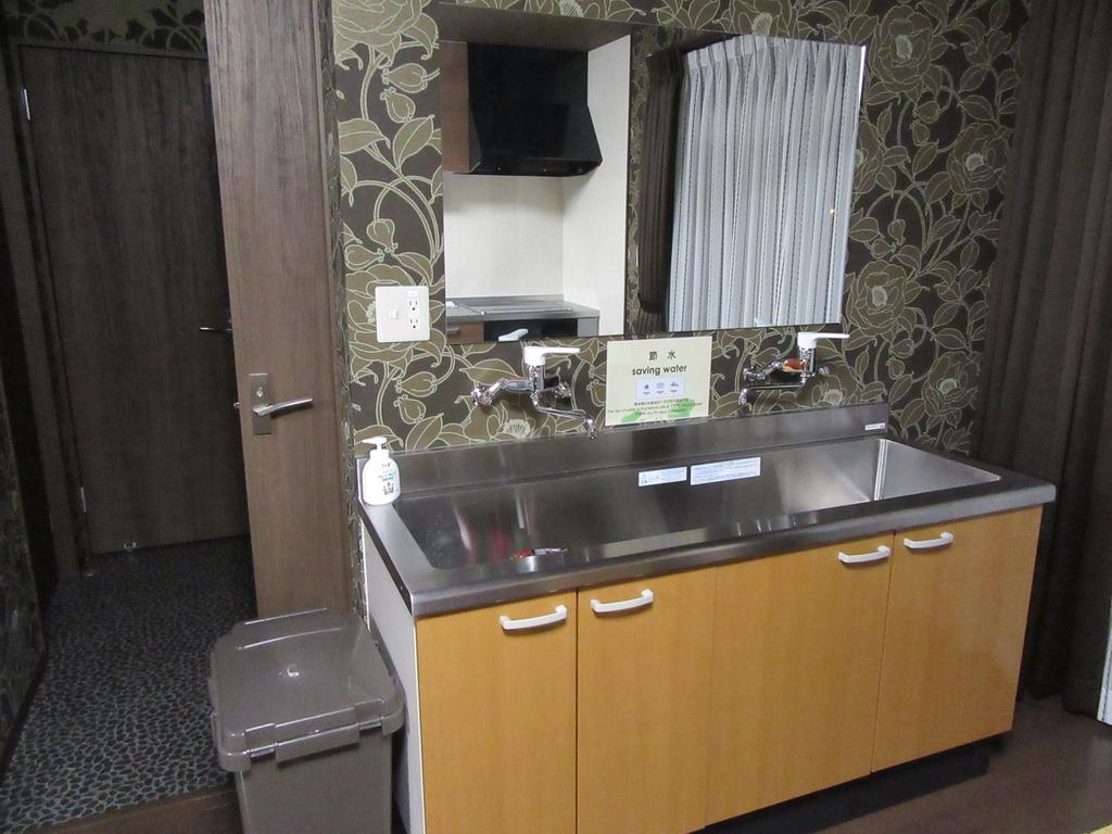 Guesthouse Tiga Кумамото Екстериор снимка