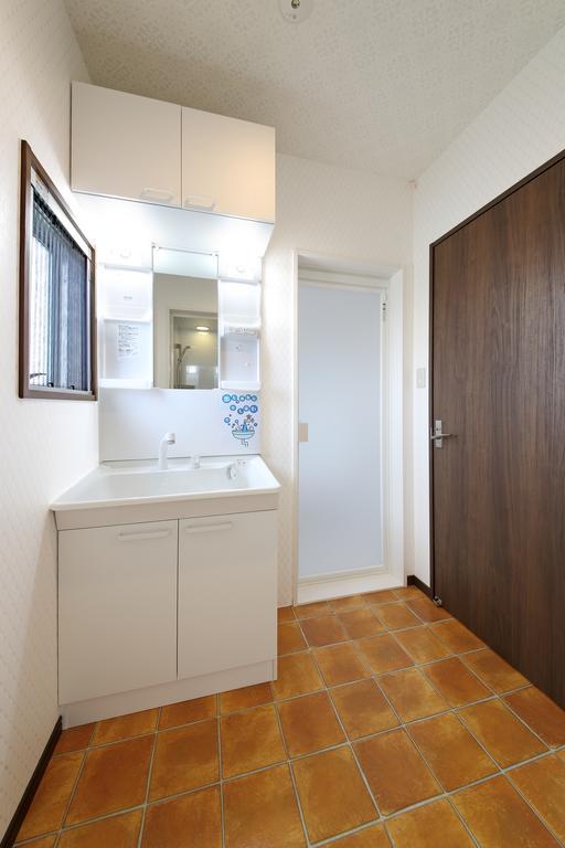 Guesthouse Tiga Кумамото Стая снимка