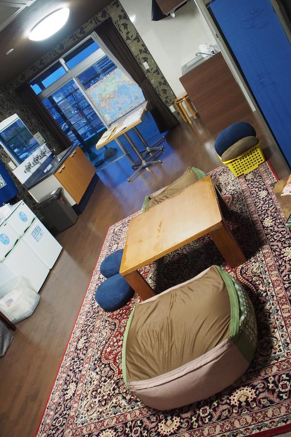 Guesthouse Tiga Кумамото Екстериор снимка